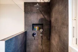 water damaged wall in bathroom