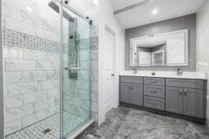 Bathroom with tile walls with accent tiles