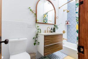 guest bathroom with decorated walls