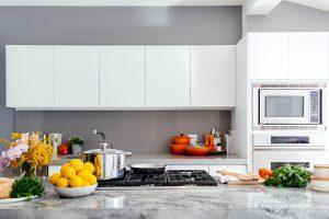 traditional kitchen with stone counters and floors