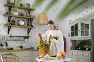 medium shot woman with groceries